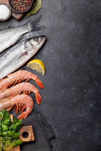 istock Fresh seafood. Trout fish and langostino shrimps 1160749864