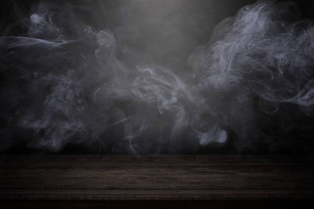 istock blank wood table with dark interior backgroundwith mist or fog and smoke backdrop to present products 1160750739