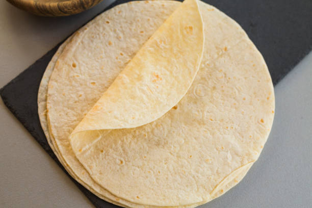 istock Thin crepes on stone slate, close-up 1160752114