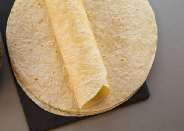 istock Thin crepes on stone slate, close-up 1160752124