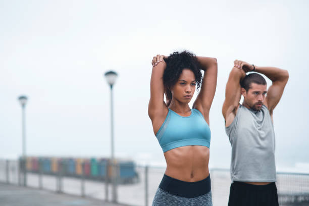 istock Focused on getting their bodies loose and limber 1160755022