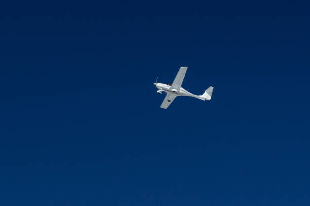 istock small old transport plane flies in the sky 1160756446