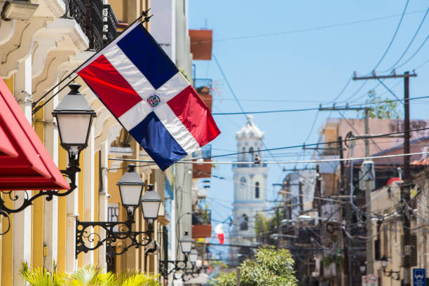 Flag of the Dominican Republic on the wall of a building in the colonial zone Archbishop Merino street. Santo Domingo dominican republic stock pictures, royalty-free photos & images