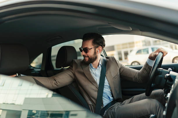 istock Businessman Driving a Car to Work 1160767466
