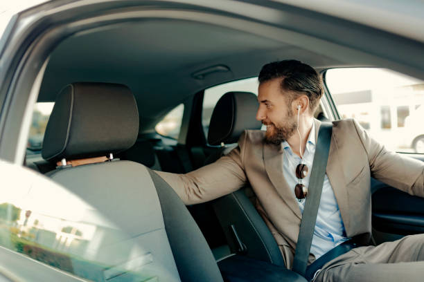 istock Businessman Driving a Car to Work 1160767598