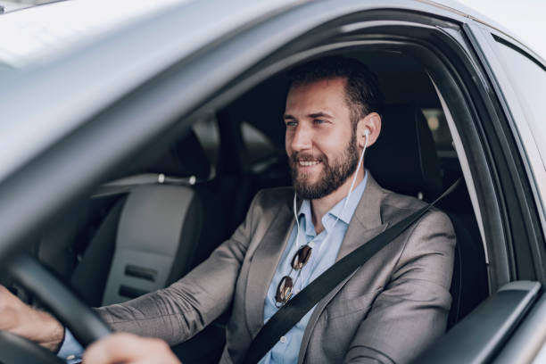 istock Businessman Driving a Car to Work 1160767648