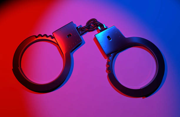 istock Real metal handcuffs. 1160768050