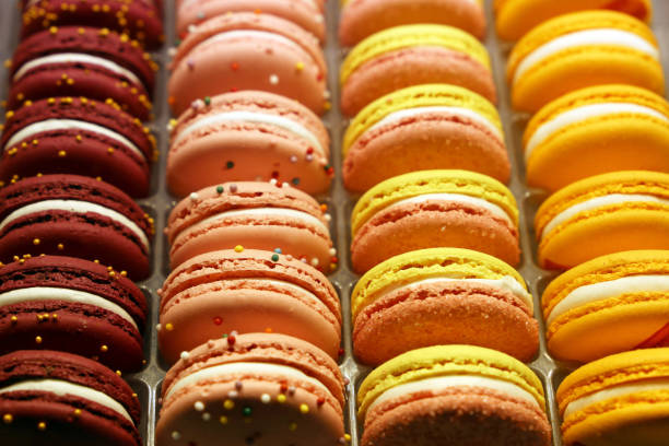 istock Macaroons in a row close up, colorful sweet background 1160771602