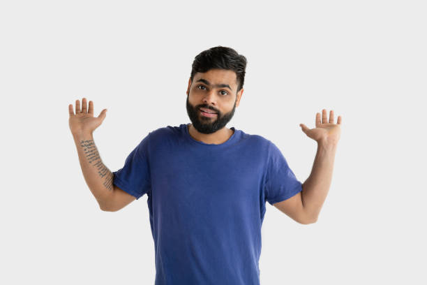 istock Portrait of young man isolated on white studio background 1160775127
