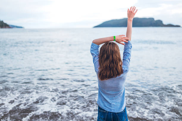 Young beautiful caucasian woman enjoying beach time.