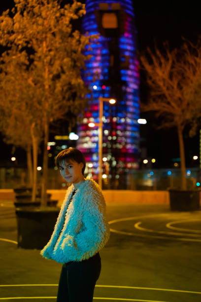 Young woman in Glories square in Barcelona stock photo