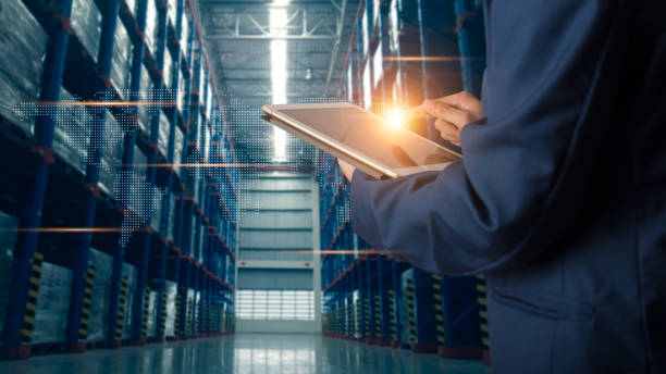 istock Logistic and transport concept : Businessman manager using tablet check and control and planning for Modern Trade warehouse logistics. 1160781276