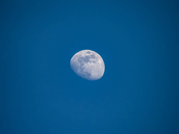 istock moon in the afternoon sky 1160783177