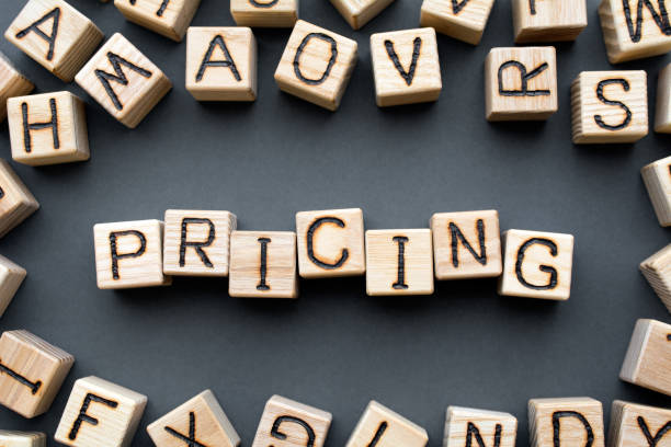 istock word pricing composed of wooden cubes 1160786462