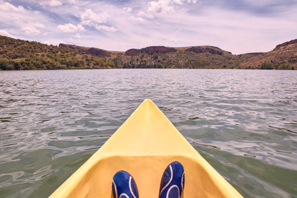 istock View of a man's feet while kayaking on the river 1160786663