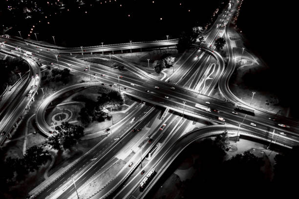 istock Aerial view Expressway motorway highway circus intersection at Night time Top view , Road traffic in city 1160790453