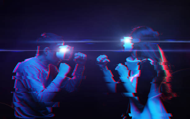 istock Couple with virtual reality headset are playing game and fighting. Image with glitch effect. 1160792533