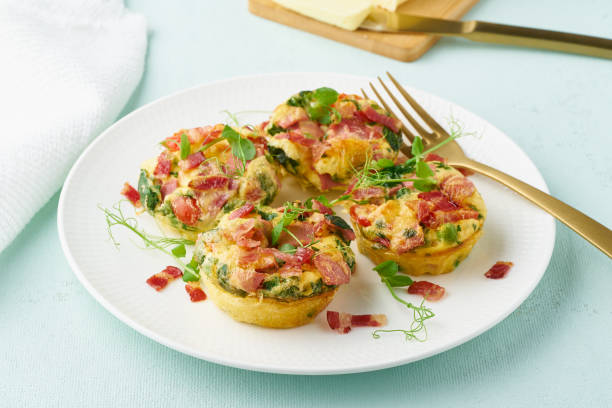 istock Egg muffin baked with bacon, ketogenic keto diet, pastel modern closeup 1160792563
