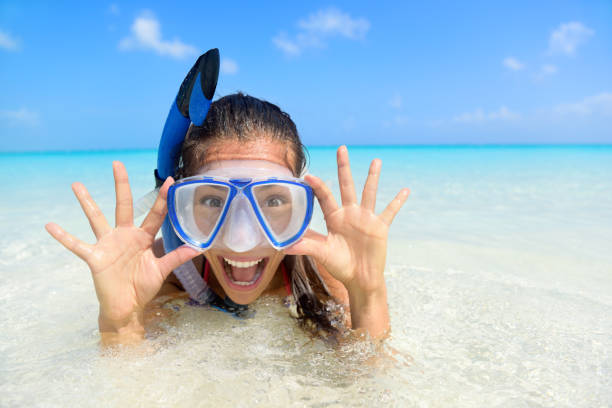 Beach vacation fun woman in snorkel mask