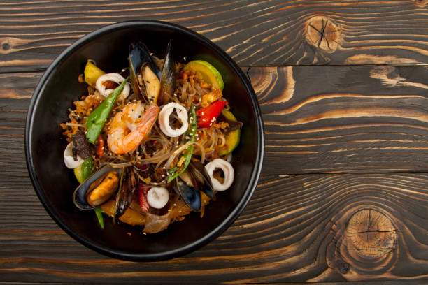 istock asian noodles with seafood and vegetables 1160796669
