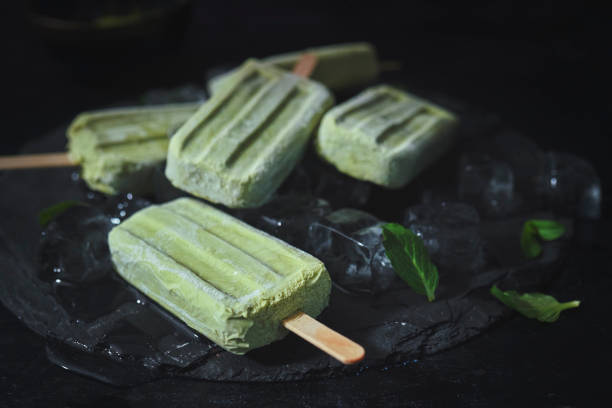 istock Matcha Green Tea Yogurt Ice Cream on Stick 1160796775