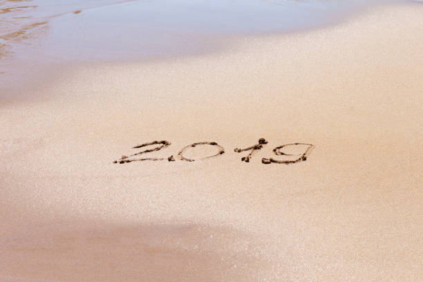 istock 2019 text on the beach. Planning vacation. 1160797451
