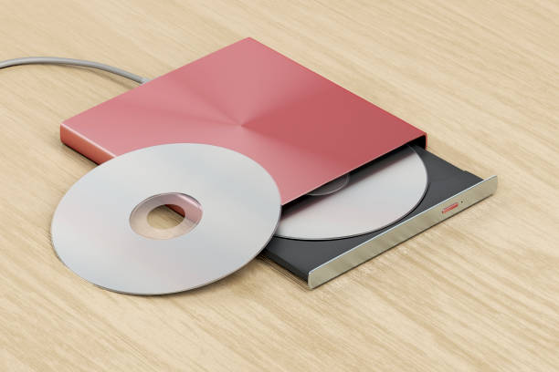 External optical drive External optical drive on wood table open cd player stock pictures, royalty-free photos & images