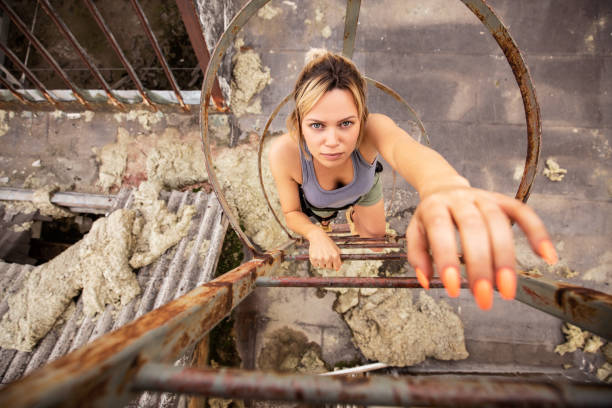 istock Young beautiful woman playing war game 1160799241