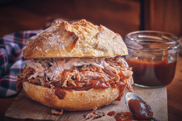 istock Pulled Pork Wrap Sandwich with Coleslaw Salad and Barbecue Sauce 1160800301