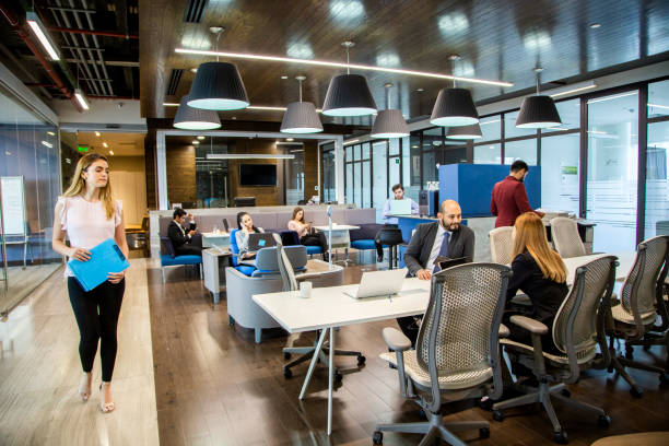 istock men and women in offices 1160801243