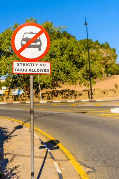 istock Road sign warning that taxis are not allowed. 1160802048