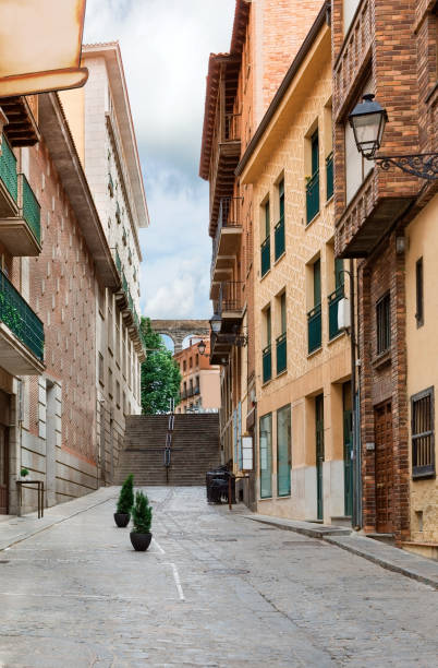 istock Beautiful narrow street in Segovia 1160802049