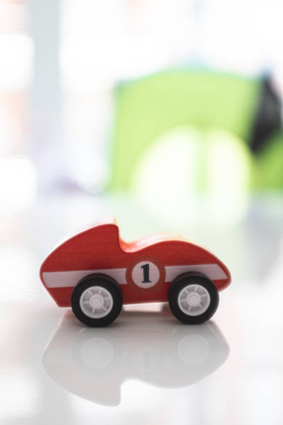 istock Red toy vintage car isolated on a white background 1160802414