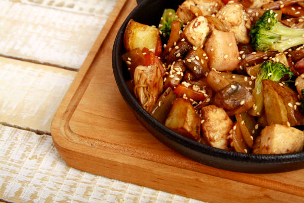 istock baked potatoes with pork and vegetables 1160803002