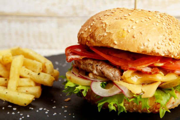 istock burger with fries and sauce 1160804271