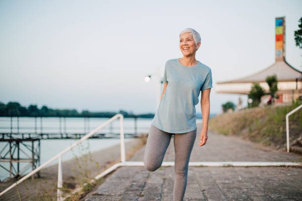 istock Older woman resting after a jog 1160804561
