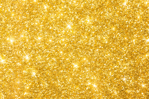istock Golden Glitter Background With Sparkles 1160804739