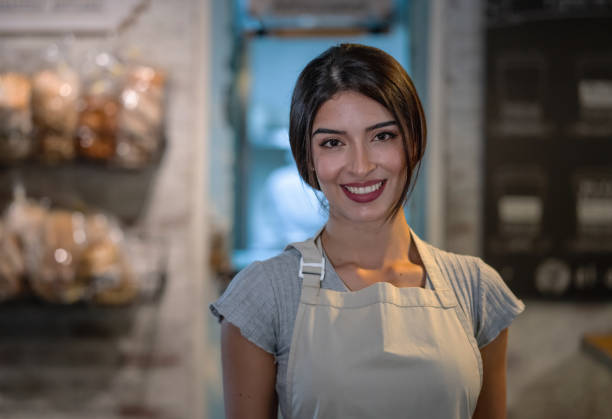 istock Portrait of a happy waitress working at a cafe 1160805935