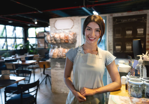 istock Woman waitressing at a restaurant 1160805939