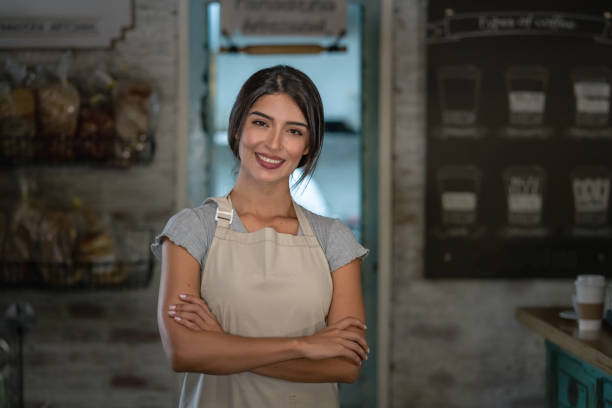 istock Happy business owner working at a cafe 1160805940