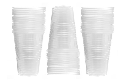 Stacks of Plastic Cups on White Background