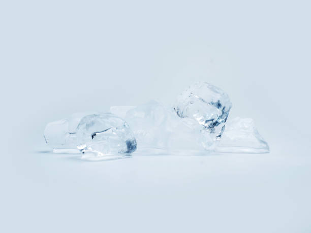 istock Melting ice cube on white background,  Clipping pats. 1160811033