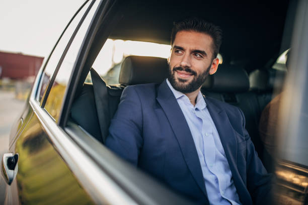 istock Businessman Into A Car 1160816846
