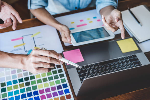 istock Team of Creative Web/Graphic Designer planning, drawing website ux app for mobile phone application and development template layout, process to developing prototype wireframe, User experience concept 1160817616