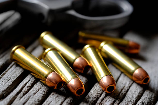 istock Handgun with bullets revolver ammunition pistol loaded 1160820290