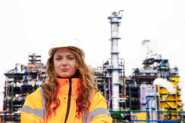 Female petrochemical inspector Female petrochemical inspector with industry. chemical worker stock pictures, royalty-free photos & images