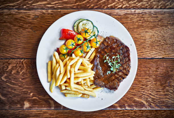istock Beef barbecue steak with french fries 1160826050