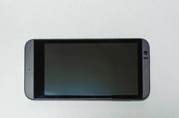 istock above horizontal view of a blank gray smartphone on white background 1160828160