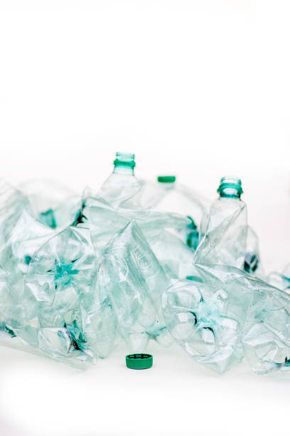 heap of empty crumpled plastic bottles on a white background - tailings container environment pollution imagens e fotografias de stock