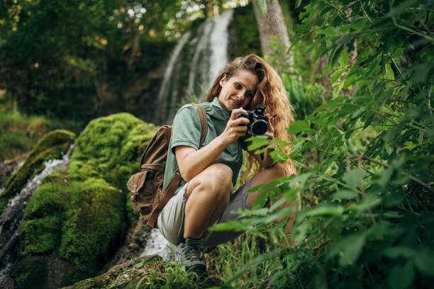 istock Female Biologist Examining Plants 1160832411